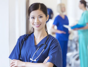 Smiling female nurse wearing stethoscope