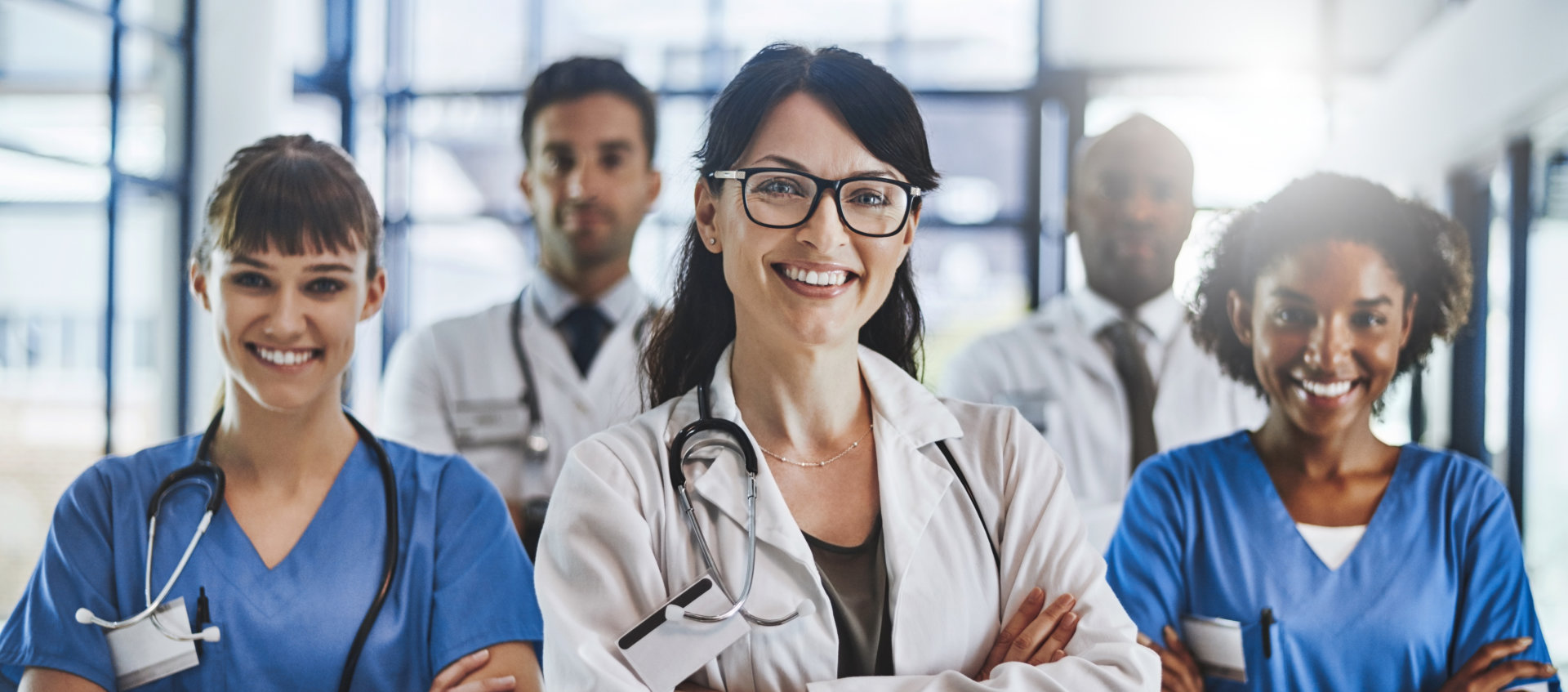 Doctors smiling at the hallway