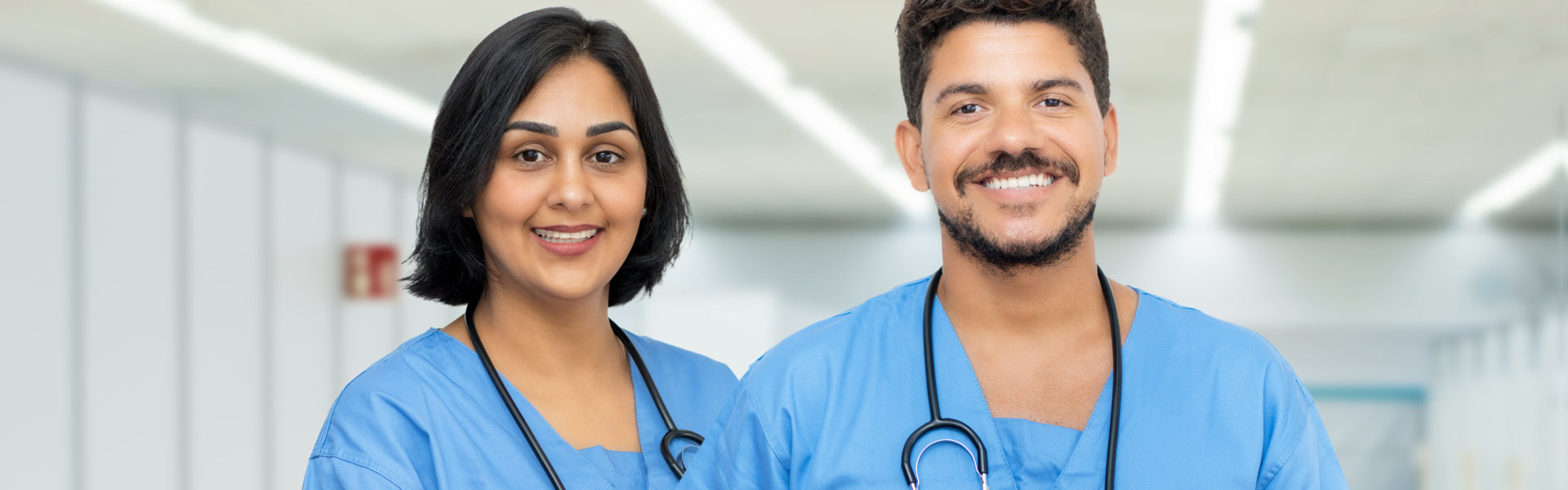 Smiling male and female nurse